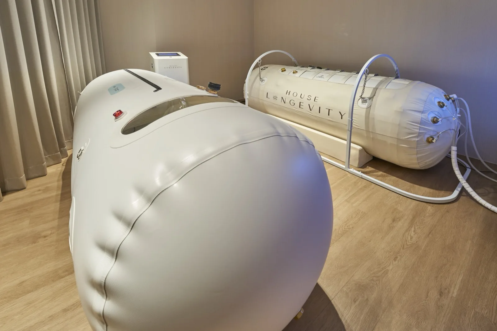 A soft hyperbaric oxygen chamber in low light.